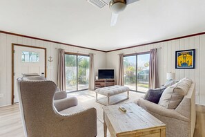 TV, fireplace - Tranquil dog-friendly family home with Gulf view, steps to private beach access (Panama City Beach)