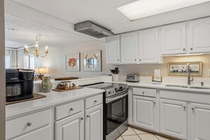 Fridge, microwave, oven, stovetop - Beachfront condo with furnished balcony, pools, tennis courts, & hot tub (Panama City Beach)