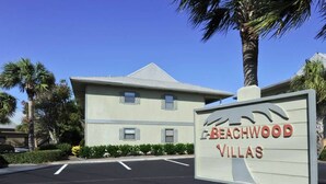 A sign for Beachwood Villas with a number 3799. - Cute ground floor condo with shared pool, access to shuffleboard and tennis (Santa Rosa Beach)