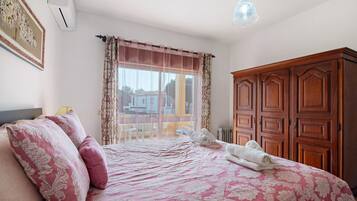 2 dormitorios, tabla de planchar con plancha, wifi y ropa de cama