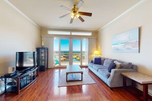 TV, offices - Charming coastal condo with rooftop pool, hot tub, & washer/dryer (Panama City Beach)