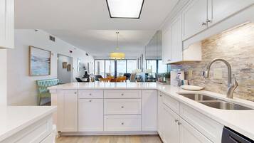 Coffee/tea maker, fridge, microwave, oven