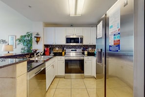 Fridge, microwave, oven, stovetop - Gulf-view condo with pools & balcony - walk to Pier Park (Panama City Beach)