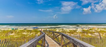 Dog-friendly beachfront home with private hot tub, fireplace, on-site pool, AC