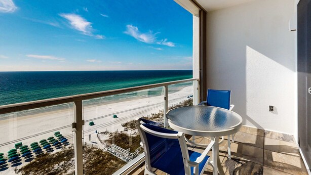 A balcony with a view of the beach and ocean. - Seaside escape with water view, balcony, pool, pool spa & gym access (Destin)