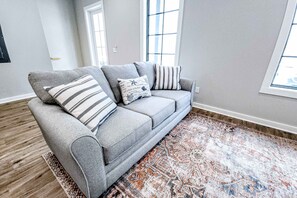 TV, offices - Dog-friendly home with two full kitchens, balcony, AC, washers & dryers (Port St. Joe)