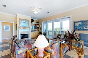 TV, fireplace, DVD player, table football - Dog-friendly home near the beach with private pool & gym (St. George Island)