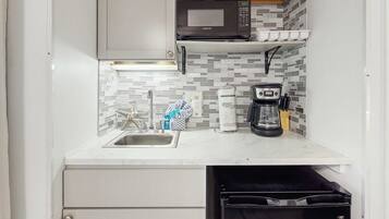 Fridge, microwave, coffee/tea maker, toaster