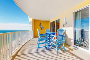 Outdoor dining - Ocean-view condo with pool, hot tub, WiFi, AC, & complimentary beach service (Panama City Beach)