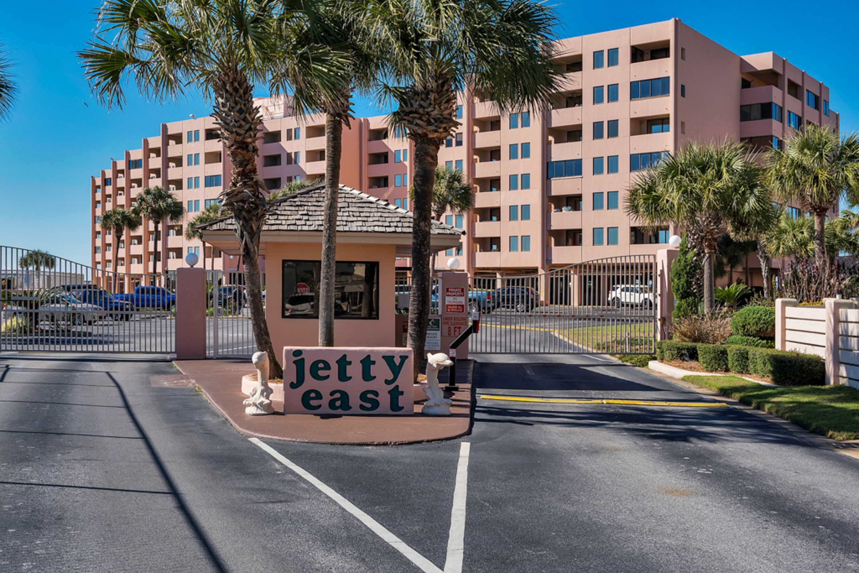 A multi-story hotel with a sign reading "Jetty East" at the entrance.