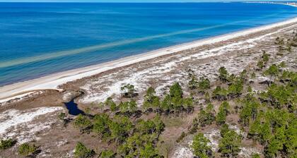 Brand-new beach house with pool, beach access, AC, & W/D