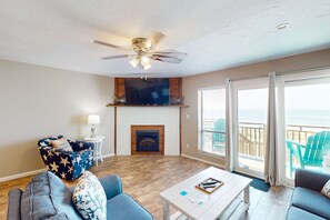 TV, fireplace, offices - Beachfront East End townhouse with beach views, deck, on-site pool & grills (St. George Island)