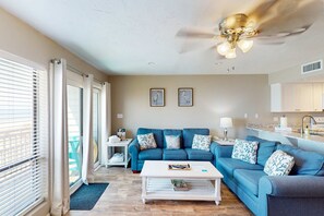 TV, fireplace, offices - Beachfront East End townhouse with beach views, deck, on-site pool & grills (St. George Island)