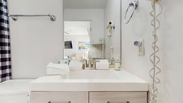 Shower, hair dryer, towels