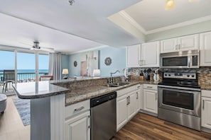 Fridge, microwave, oven, stovetop - Gulf-front condo with balcony, beach access, pool & hot tub (Destin)