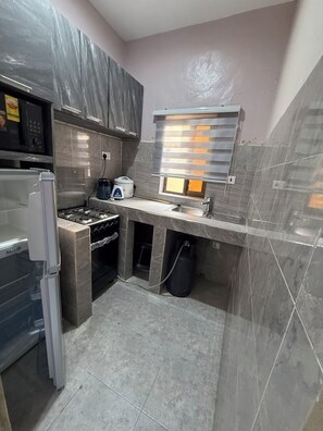 Imagen sin descripción, 5 de 7, botón