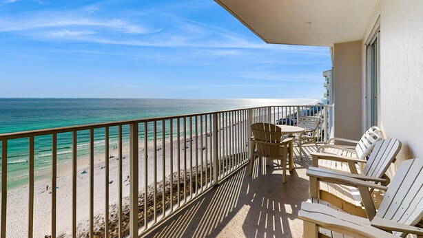 A balcony with a view of the beach and ocean. - Majestic Sun B1011 | Beachfront Condo with Pool! (Miramar Beach)