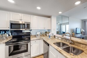 Fridge, microwave, oven, stovetop - Captiva” beachfront condo w/ ocean views and pool & fitness center access (Destin)