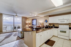 Fridge, microwave, oven, stovetop - Inviting waterfront condo w/ shared pools, a hot tub, gym, & beach access (Panama City Beach)