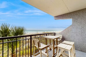 Outdoor dining - 2nd-floor, spacious, beachfront condo with ocean views - close to entertainment (Fort Walton Beach)