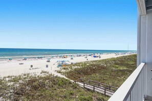 On the beach - Bright Gulf-front condo with two balconies, pool, central AC, & W/D (Panama City Beach)