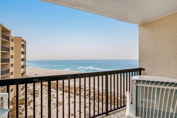 A balcony with a view of the beach and ocean. - Great Pinnacle Port villa with lots of character & balcony - steps from beach (Panama City Beach)