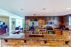 Fridge, microwave, oven, stovetop - Stunning corner-condo with panoramic views, wraparound deck & beach access (Panama City Beach)
