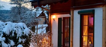 Chalet 'Ladolcevital in Tyrolean Timber House' with Valley View & Private Sun Terrace by the Forest