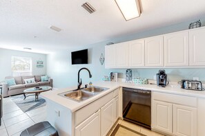 Fridge, microwave, oven, stovetop - Sunny coastal condo with pool, balcony & sound view - walk to the beach (Navarre Beach)