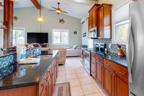 Dog friendly cottage near the beach with patio, grill, washer, dryer, partial AC