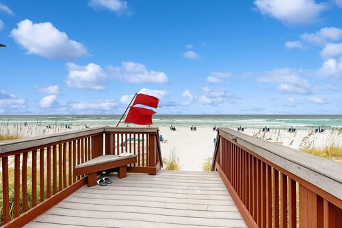 Gorgeous ground-floor beachfront condo, shared pool and beach access!