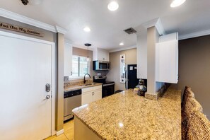 Fridge, microwave, oven, stovetop - Cozy coastal condo with pool, easy beach access, balcony & canal views (Destin)