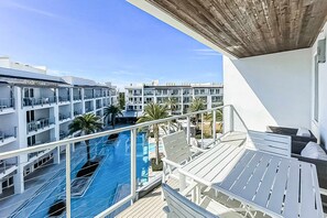 Outdoor dining - Pool-view condo with on-site pool, hot tub, roof deck, gym, & balcony (Inlet Beach)
