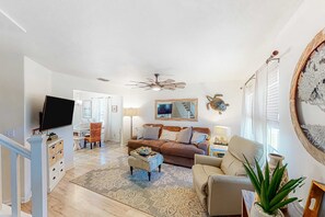 TV, offices - Inviting home near the beach with large decks & charming interior - dog-friendly (Port St. Joe)