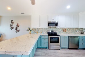 Fridge, microwave, oven, stovetop - Gulf view getaway with WiFi, sunroom, gas grill, AC, & full kitchen (Mexico Beach)