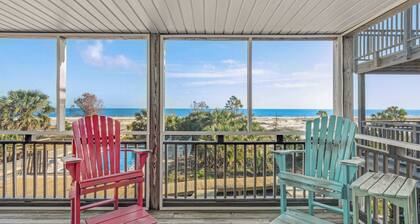 Beachfront home with screened porch with boardwalk access to pool