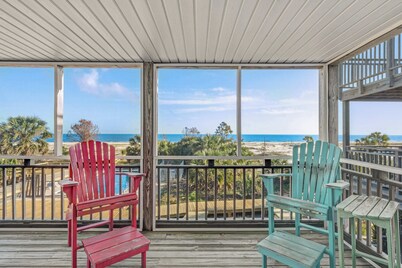 Beachfront home with screened porch with boardwalk access to pool
