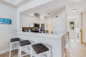 Fridge, microwave, oven, stovetop - Bright, Airy Condo with Shared Outdoor Pool, High-Speed WiFi, and Central AC (Santa Rosa Beach)