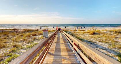 Inviting townhouse with on-site pool, updated interior, & W/D