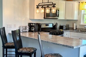 Fridge, microwave, oven, stovetop - Dog-friendly ocean-view house with central AC & washer/dryer - snowbird-friendly (St. George Island)