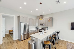 Fridge, microwave, oven, stovetop - Dog-friendly bay view duplex with full kitchen, washer/dryer, & central AC (Port St. Joe)