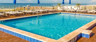 Beautiful & open home with enclosed porch, game room, W/D - beach & pool access