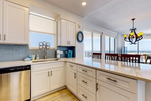 Fridge, microwave, oven, stovetop - Gulf-front 3-bedroom condo with balconies off each bedroom & pickleball (Santa Rosa Beach)