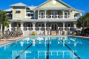 Pool - Spacious dog-friendly home with elevator, screened decks, on-site pool, & gym (St. George Island)