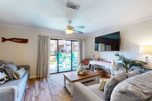 TV, offices - Renovated Townhome with Central AC, Shared Pools & Hot Tubs–Minutes to Beach (Panama City Beach)