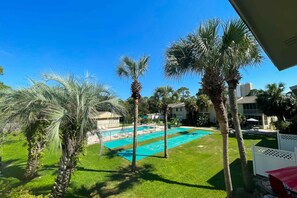 Property grounds - Dog-friendly townhome with beach access, pool, tennis, gym, W/D, & central AC (Panama City Beach)