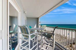 Outdoor dining - Beachfront condo with pool, huge balcony, W&D & central AC - drive to dining (Fort Walton Beach)