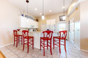 Fridge, microwave, oven, stovetop - Colorful Beach House with Outdoor Pool, WiFi, Washer/Dryer, & Central A/C (Panama City Beach)