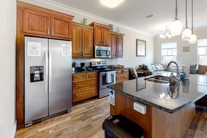 Fridge, microwave, oven, stovetop - Dog-friendly beach house with balcony, fenced yard, & AC - walk to beach (Panama City Beach)