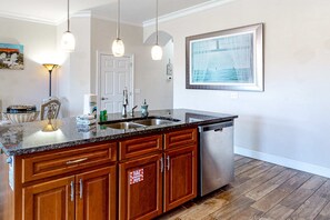 Fridge, microwave, oven, stovetop - Dog-friendly beach house with balcony, fenced yard, & AC - walk to beach (Panama City Beach)